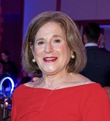 Bonni Brodnick wearing a red dress