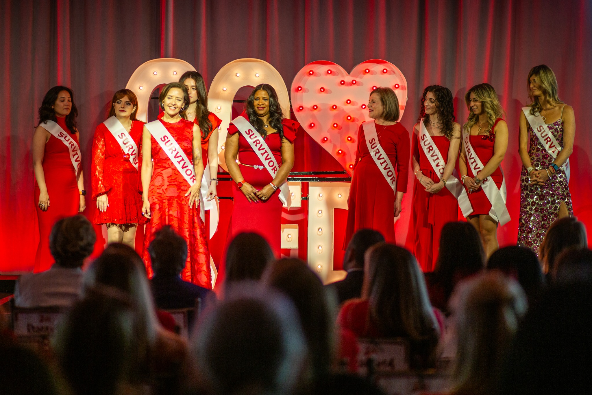 Sharon Bond standing with fellow heart attack survivors at a heart health event